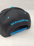 SK8SUPPLY Wes Humpston Skull Logo snap back hat - BLACK / BLUE BILL SILVER